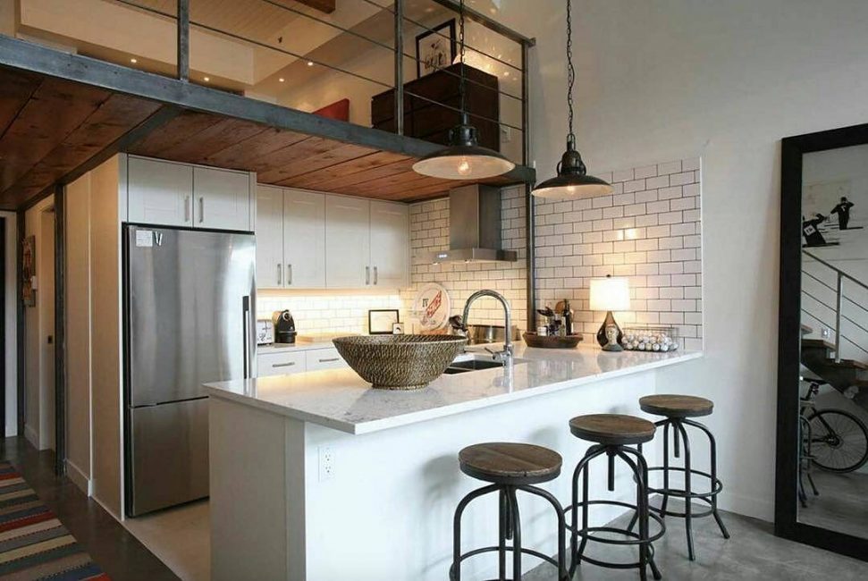 Cozinha de estilo loft apresenta um acabamento áspero