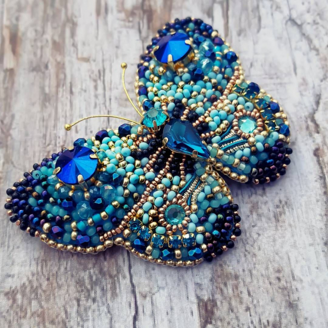 Broche de borboleta azul