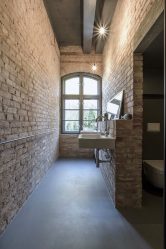 Decoração de casa de banho com pedra artificial: lavatório, bancada, prateleiras. Recursos de uso de material