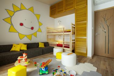 Projetar um quarto de crianças com um sofá macio: como e onde devo colocá-lo?