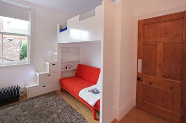 Projetar um quarto de crianças com um sofá macio: como e onde devo colocá-lo?