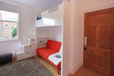 Projetar um quarto de crianças com um sofá macio: como e onde devo colocá-lo?