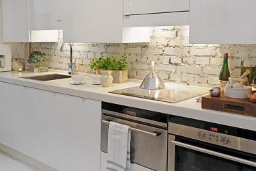 Pedra decorativa na cozinha - 130 opções de design para belos desenhos