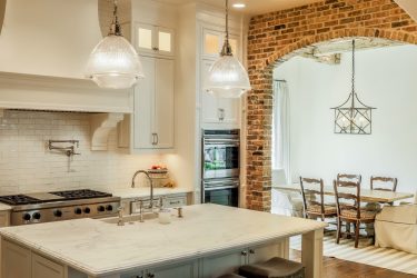 Pedra decorativa na cozinha - 130 opções de design para belos desenhos