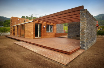 Projects of one-storey houses from a bar: Rules of design, advantages and disadvantages