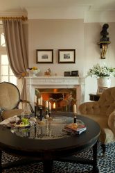 Elegância discreta do estilo americano: Escolhendo um design para um apartamento (sala de estar, quarto, cozinha)