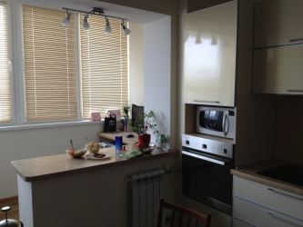Cozinha combinada com loggia: maneiras reais de usar o local com sabedoria. Design de interiores não chato (mais de 120 fotos)